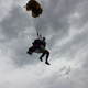 Illustration for article titled Pure Nerd Insanity: Two Men Skydiving with a Girly Hug Pillow